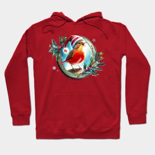 A red bird in a Christmas hat singing on a branch inside a festive winter frame of mistletoe and winter berries and snow flakes Hoodie